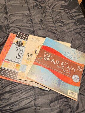 Cardstock paper various designs; remnants of the books shown